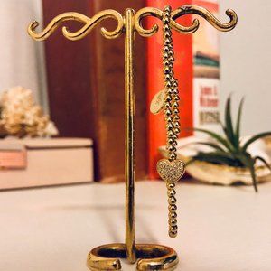 Gold colored bracelet with heart